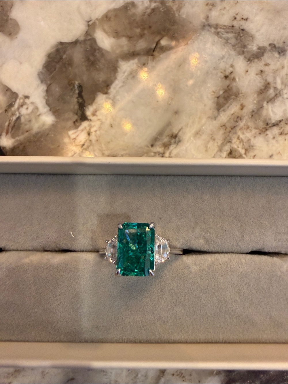 Emerald-Cut Green Statement Ring with Side Stones